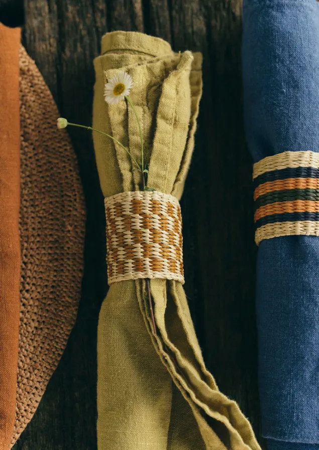 hand_woven_iraca_napkin_rings_14-1.webp Textiles | Kitchen-TOAST Hand Woven Iraca Napkin Rings Brick/Multi