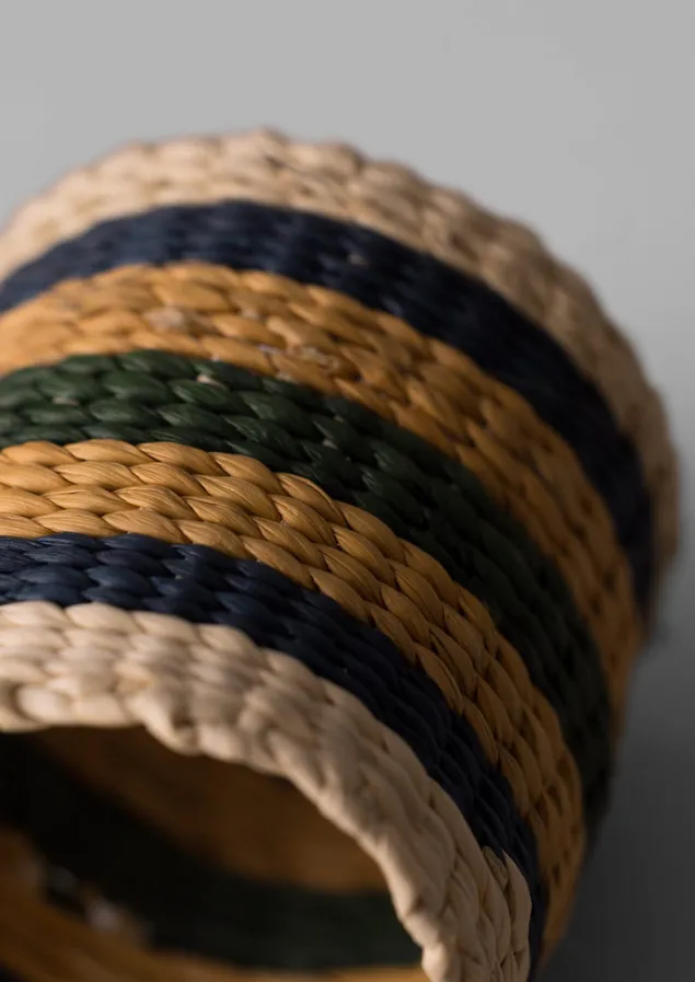 hand_woven_iraca_napkin_rings_17.webp Textiles | Kitchen-TOAST Hand Woven Iraca Napkin Rings Brick/Multi